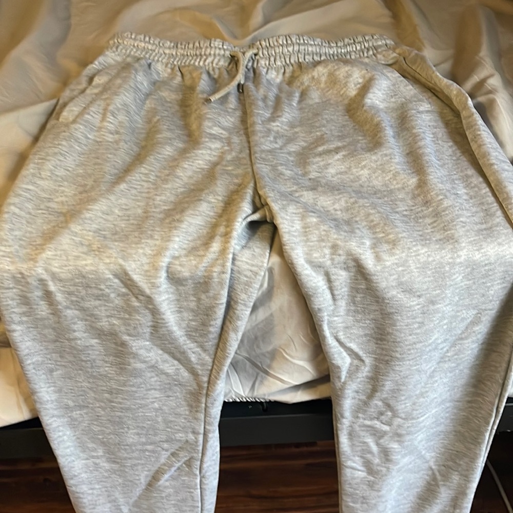 Stacked grey drawstring waist sweat pants